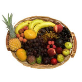Cesta de frutas enteras con pasas